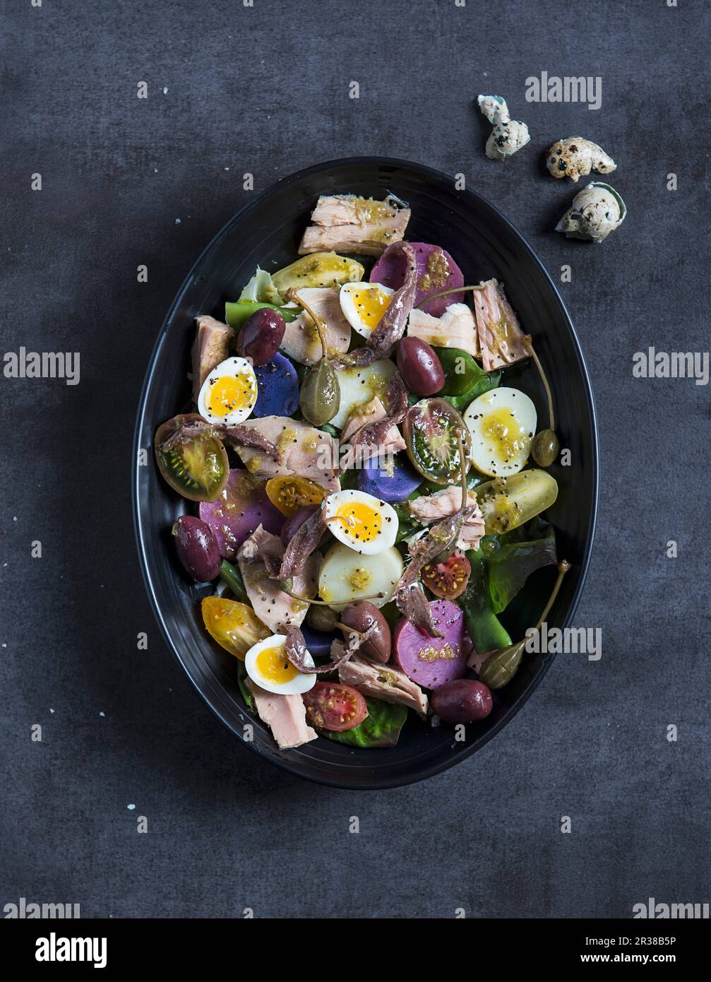 Salad nicoise, tuna, anchovy and quail egg Stock Photo Alamy