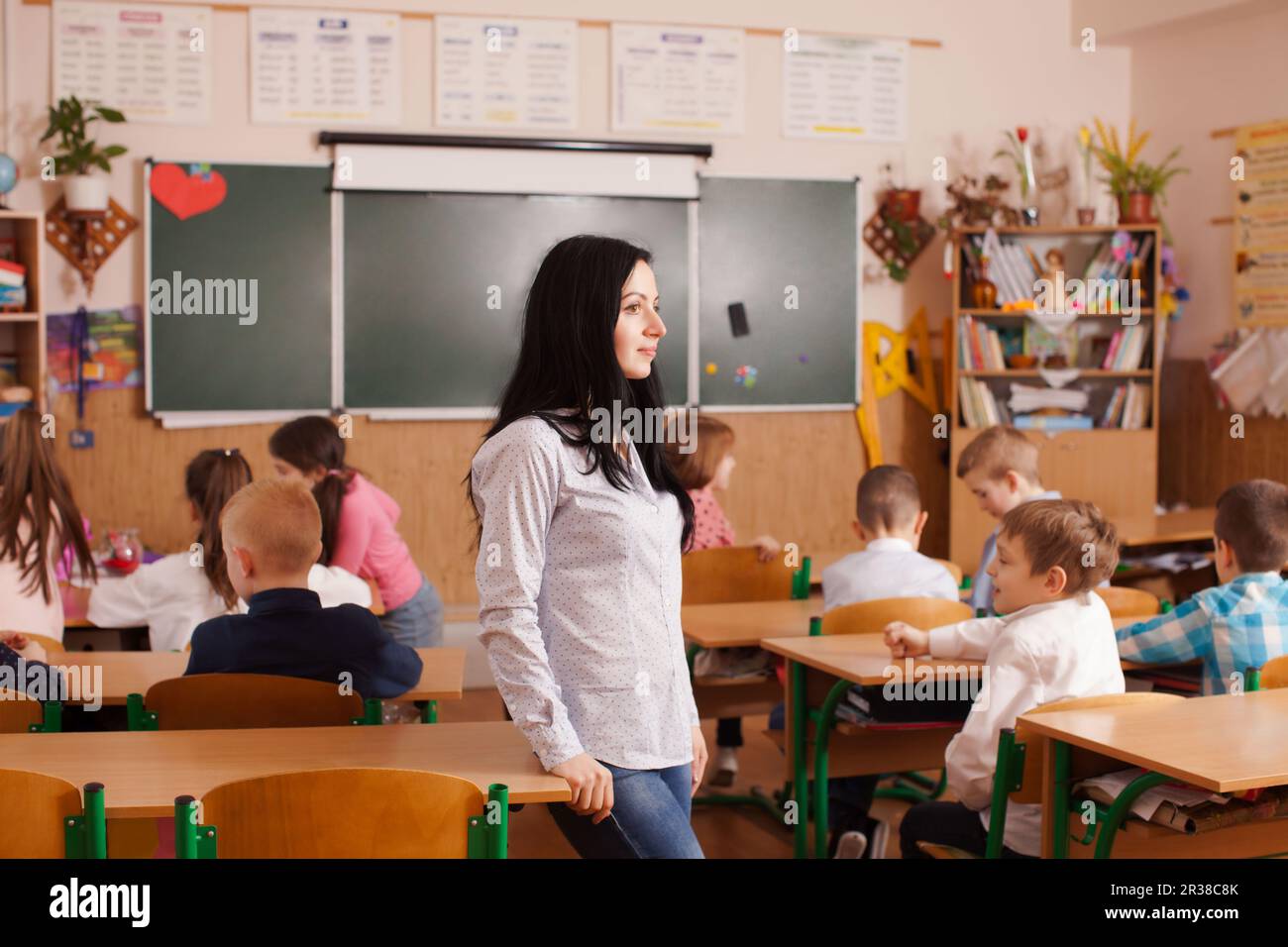 Teacher starts the lesson Stock Photo - Alamy