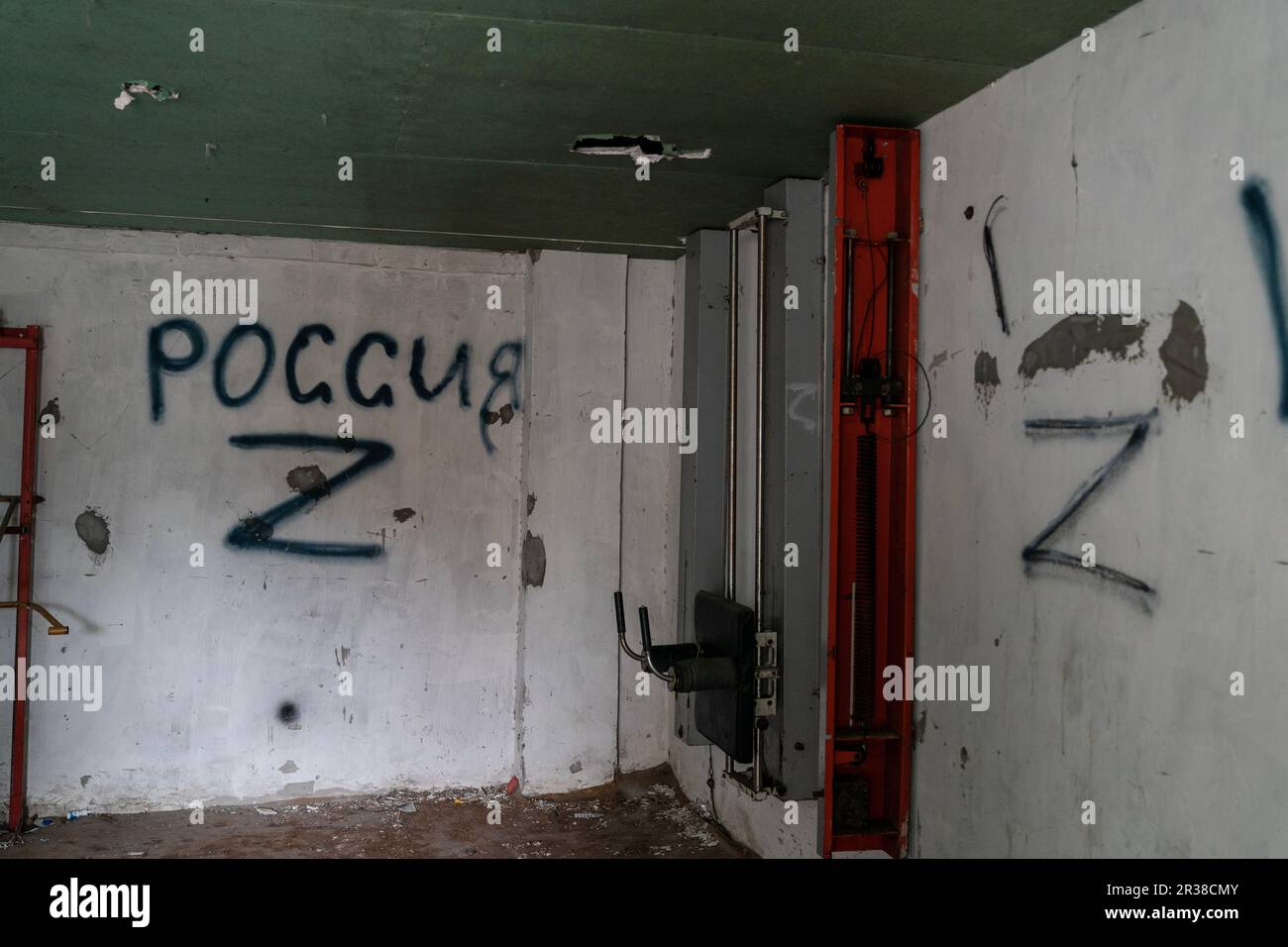 View of inscriptions on walls of garage in main police station in Kherson left by Russian during occupation on May 22, 2023 Stock Photo