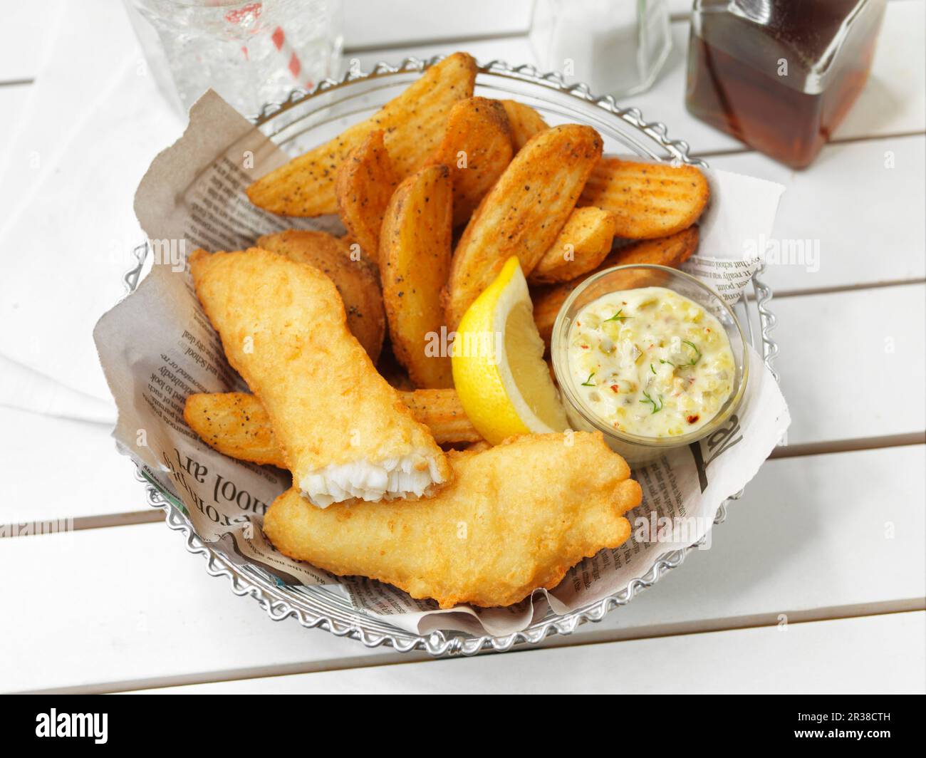 Fish and chips with a dip and lemon Stock Photo Alamy
