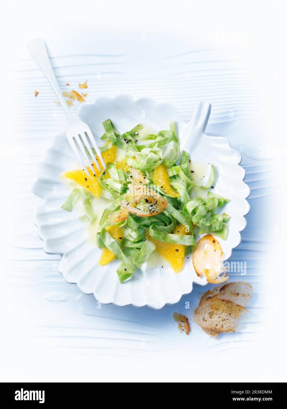 Pointed cabbage salad with orange dressing Stock Photo