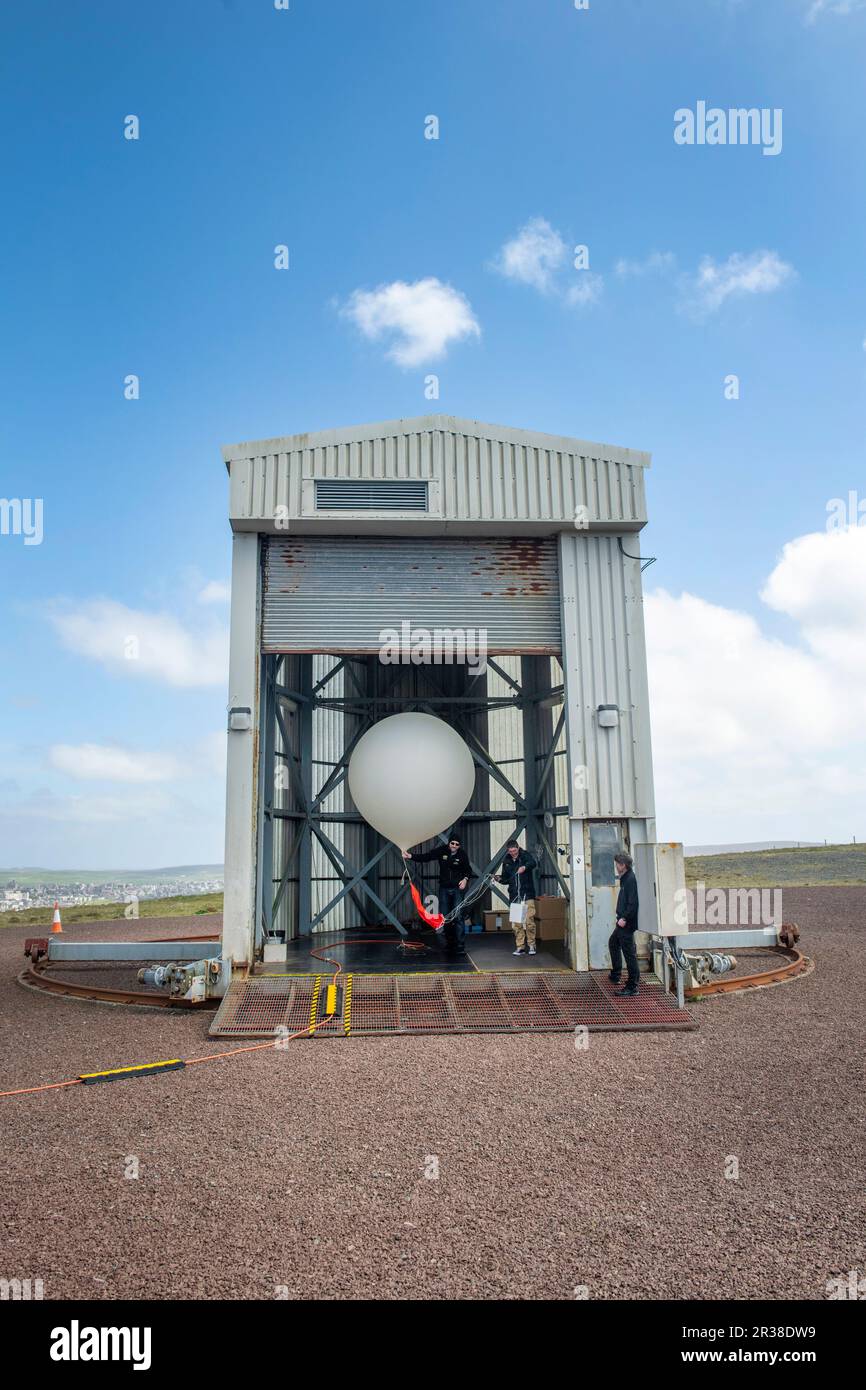 Weather balloon being released from Lerwick Met Station on the Shetland Isles off Scotland. Stock Photo