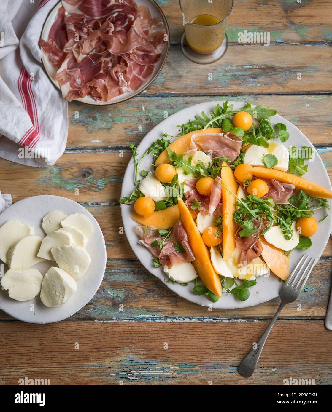 Mozzarella salad with melon and prosciutto Stock Photo