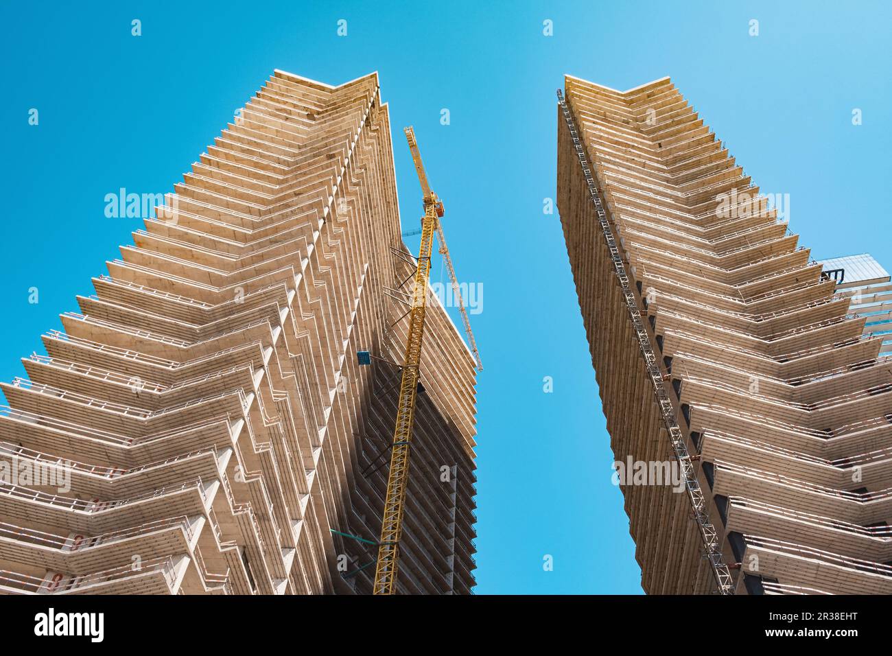 Residential buildings construction site with crane. New build