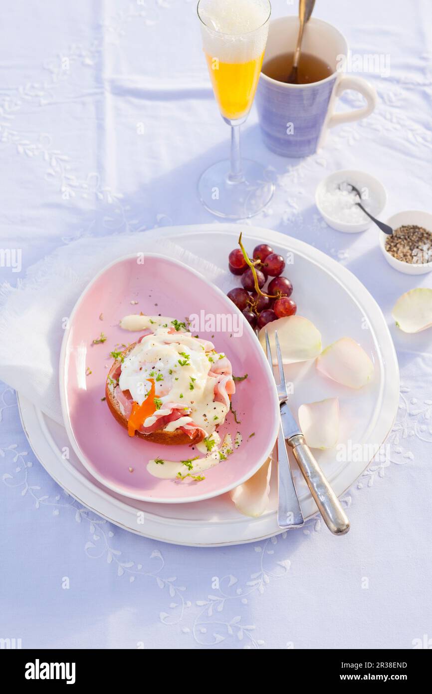 Eggs Benedict with parsley Stock Photo