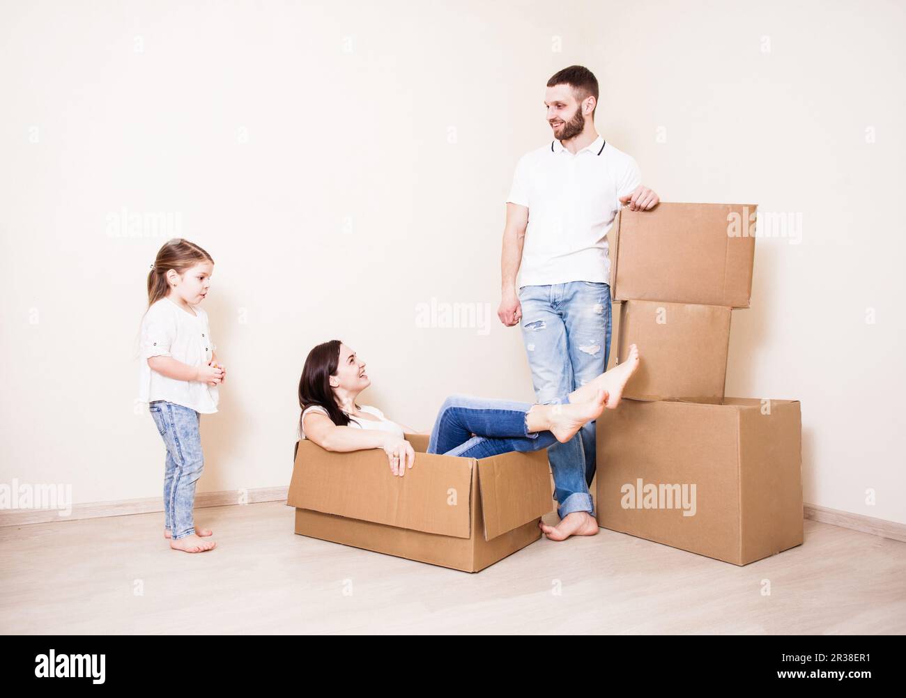 Rest during unpacking boxes Stock Photo - Alamy
