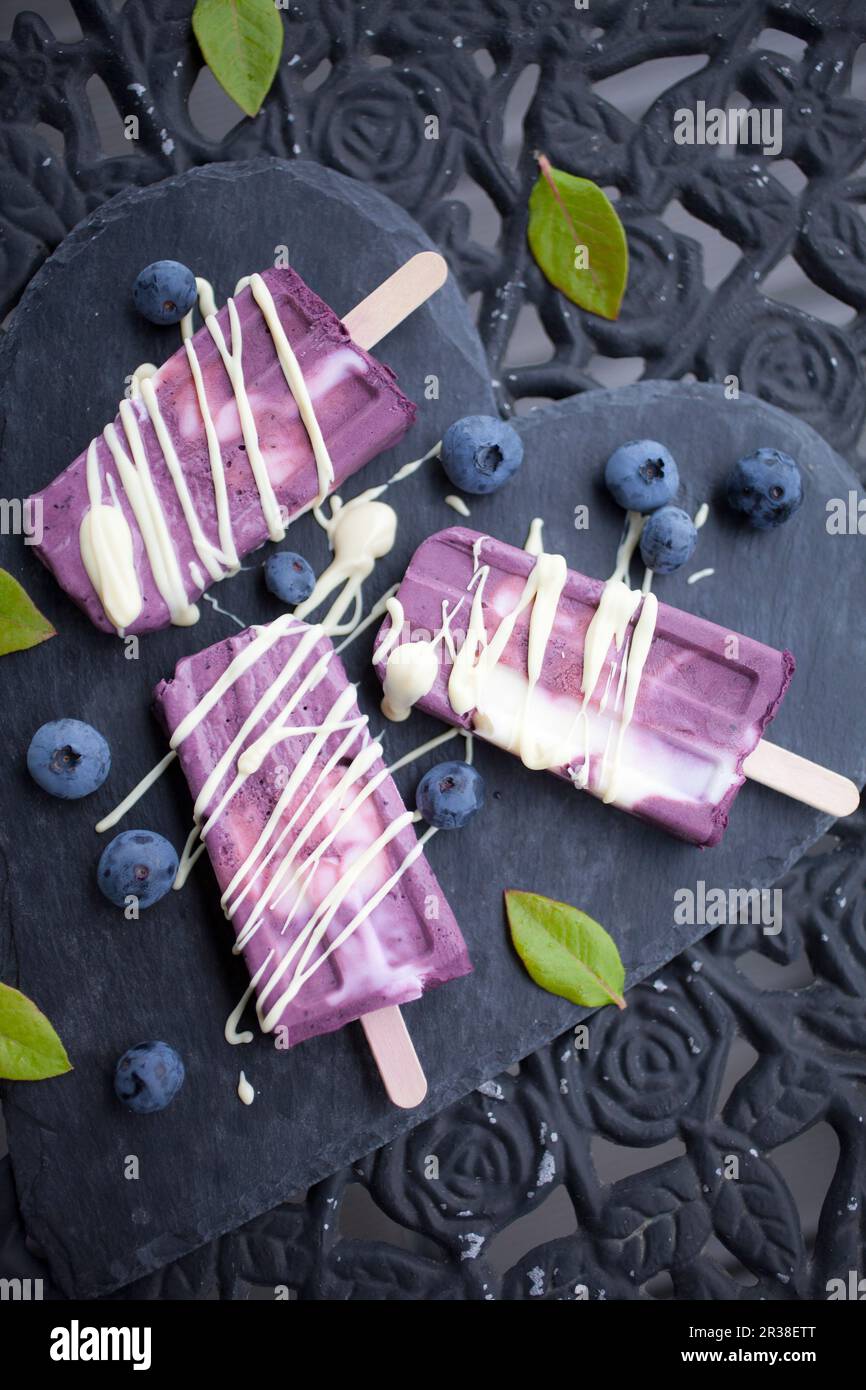 Blueberry yogurt ice cream sticks Stock Photo Alamy