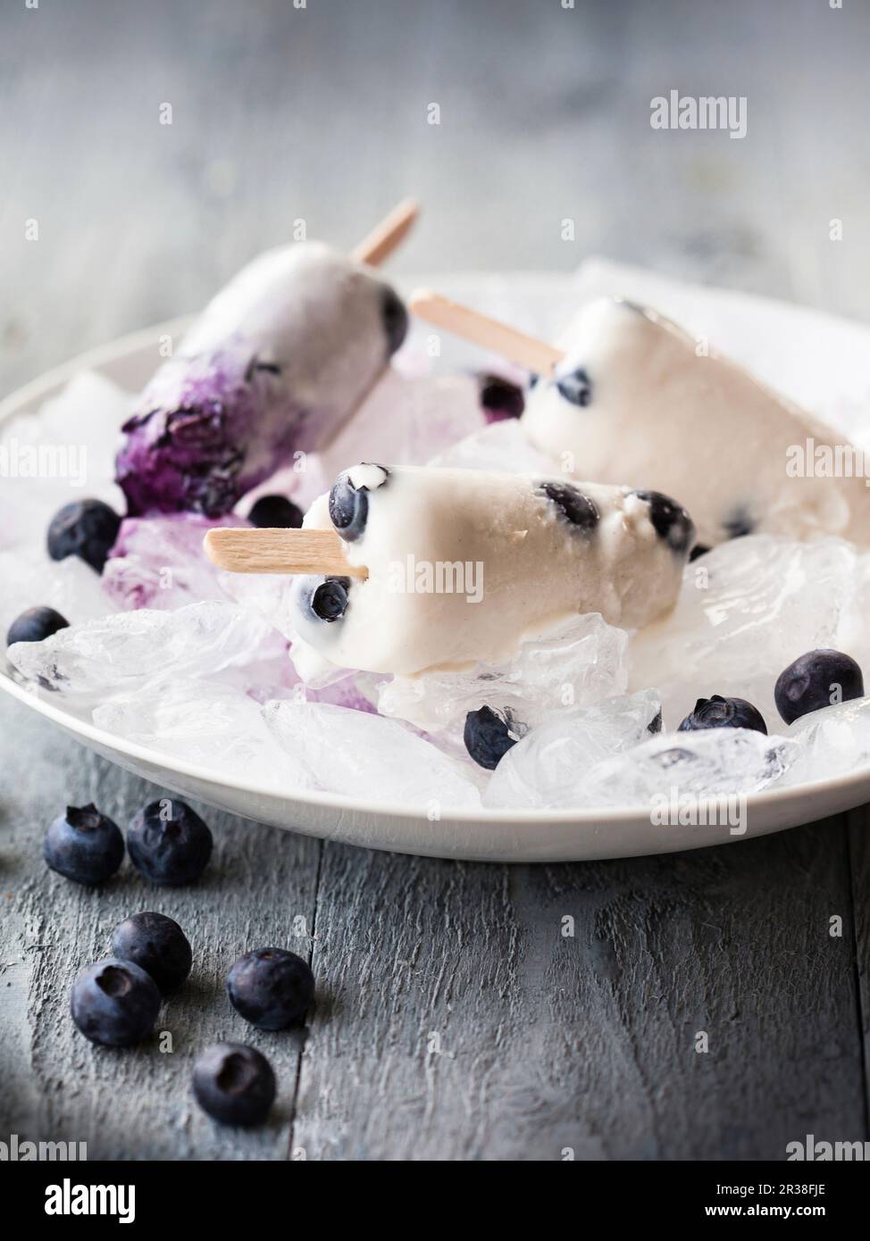 Coconut and blueberry ice cream sticks Stock Photo Alamy
