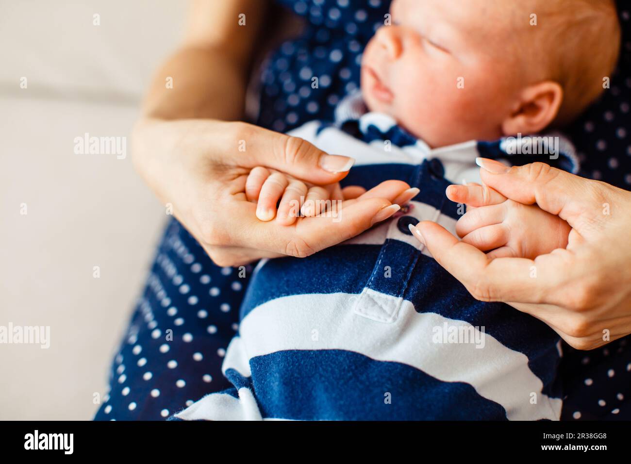 Close view of newborn baby's hands Stock Photo