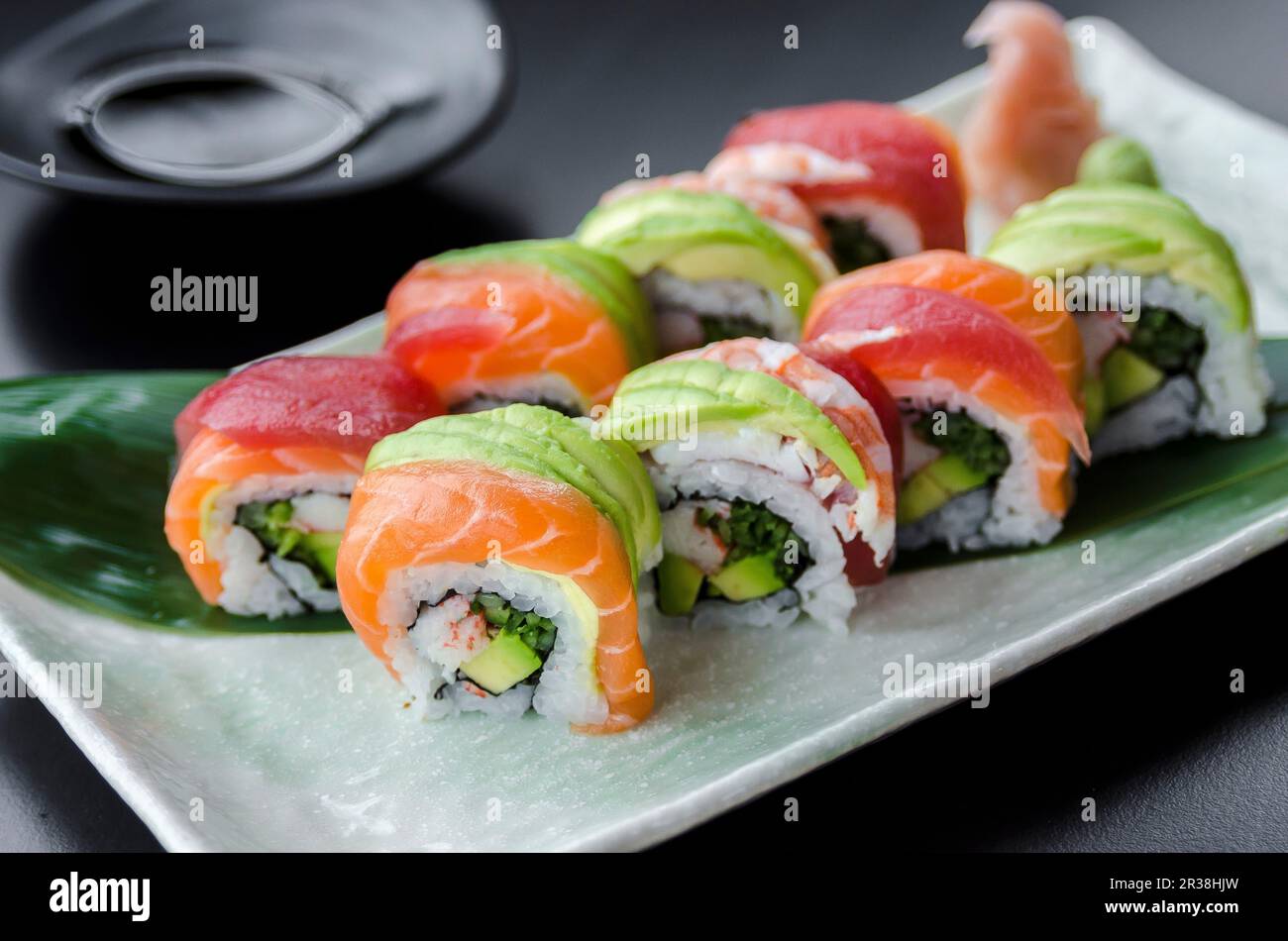 https://c8.alamy.com/comp/2R38HJW/japanese-platter-of-rainbow-rolls-maki-inside-out-seaweed-and-rice-roll-2R38HJW.jpg