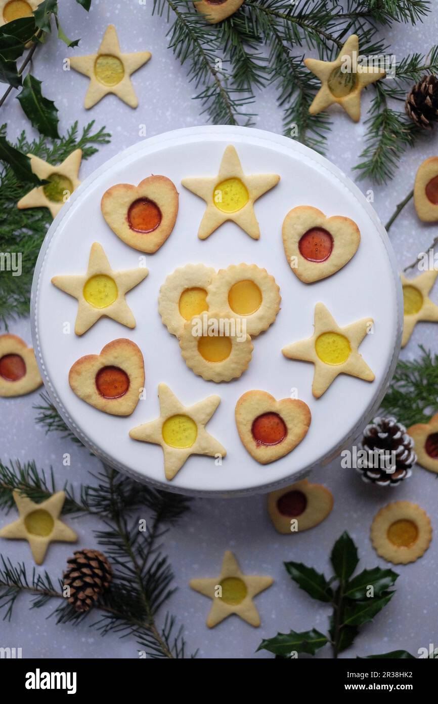 Stainedglass window biscuits for Christmas Stock Photo Alamy
