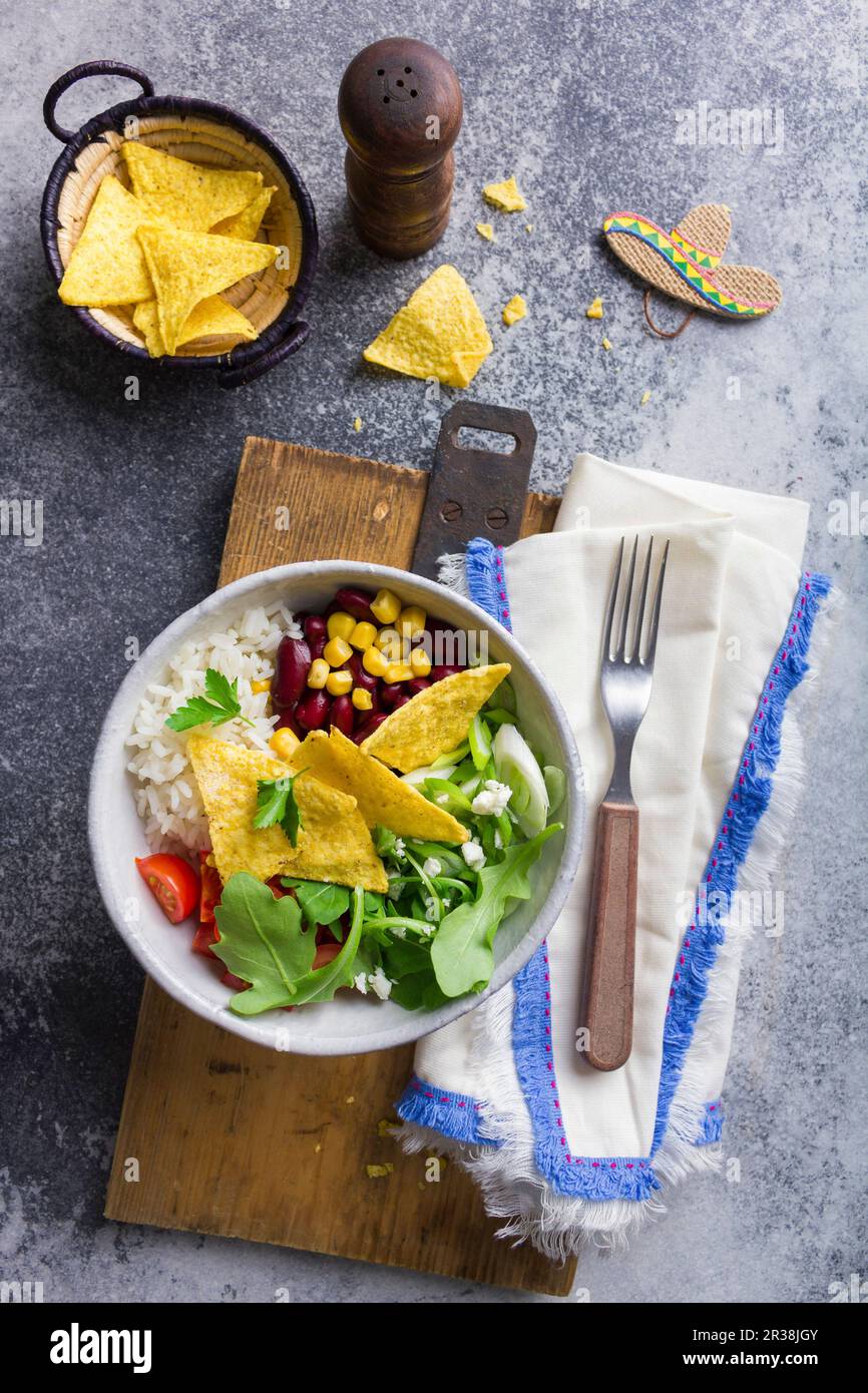 Salad with rice, kidney beans, sweetcorn and tortilla chips (Mexico