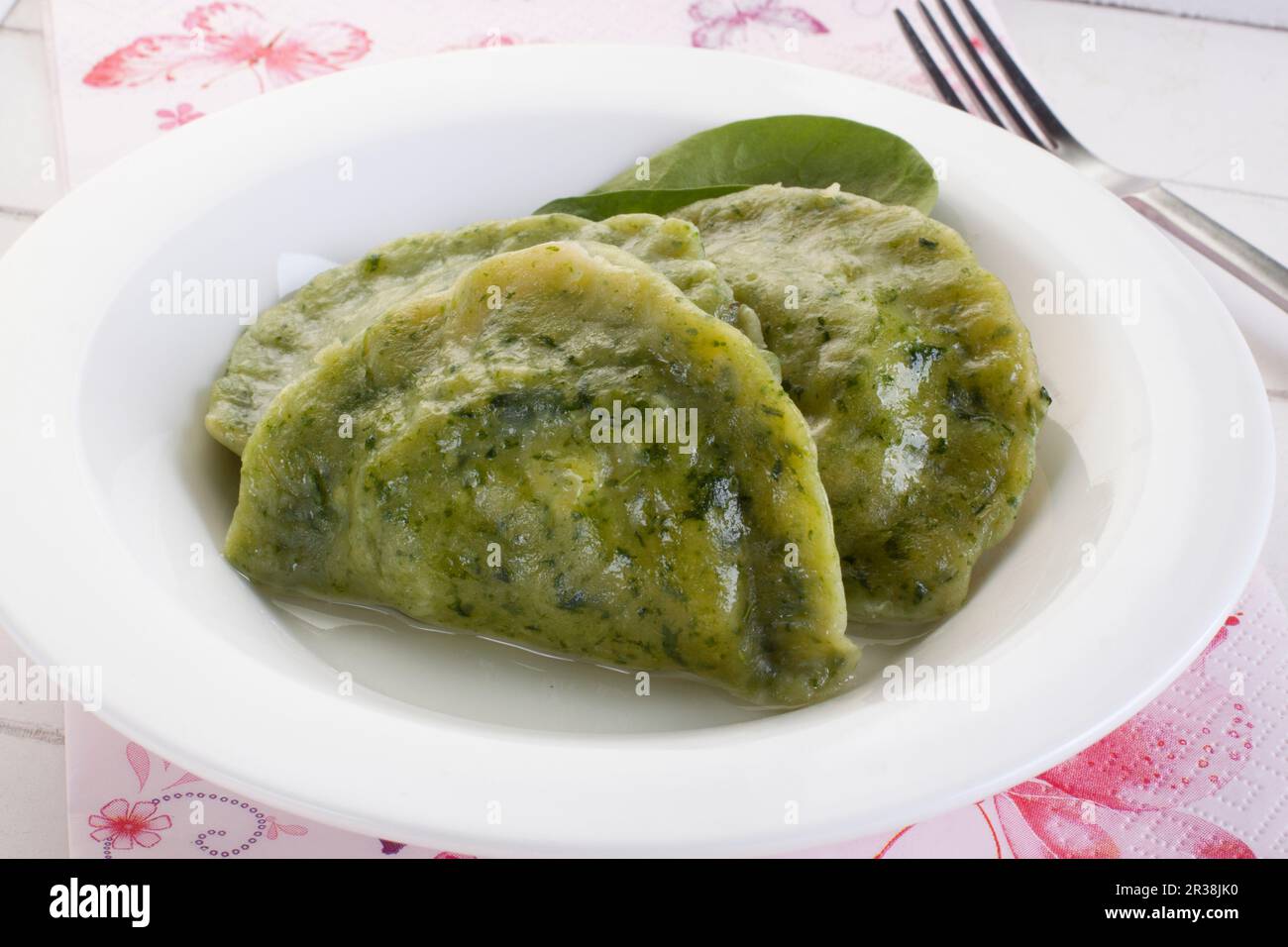 Spinach pierogi (cooked dumplings) with cottage cheese Stock Photo Alamy