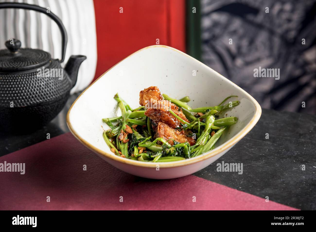 Filipino style water spinach with oyster sauce and garlic topped with
