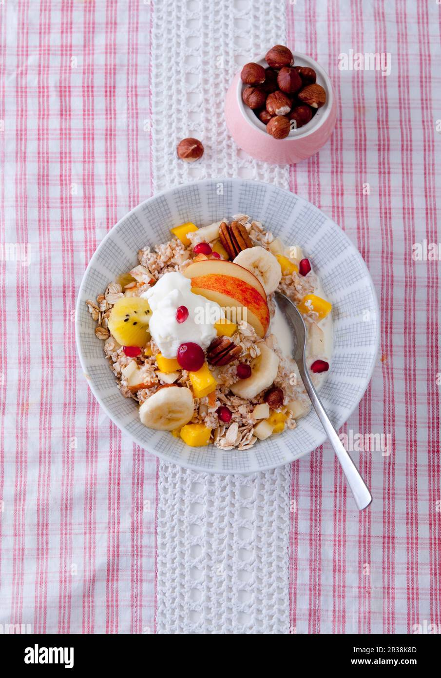 Bircher muesli with apples and exotic fruit (seen from above Stock