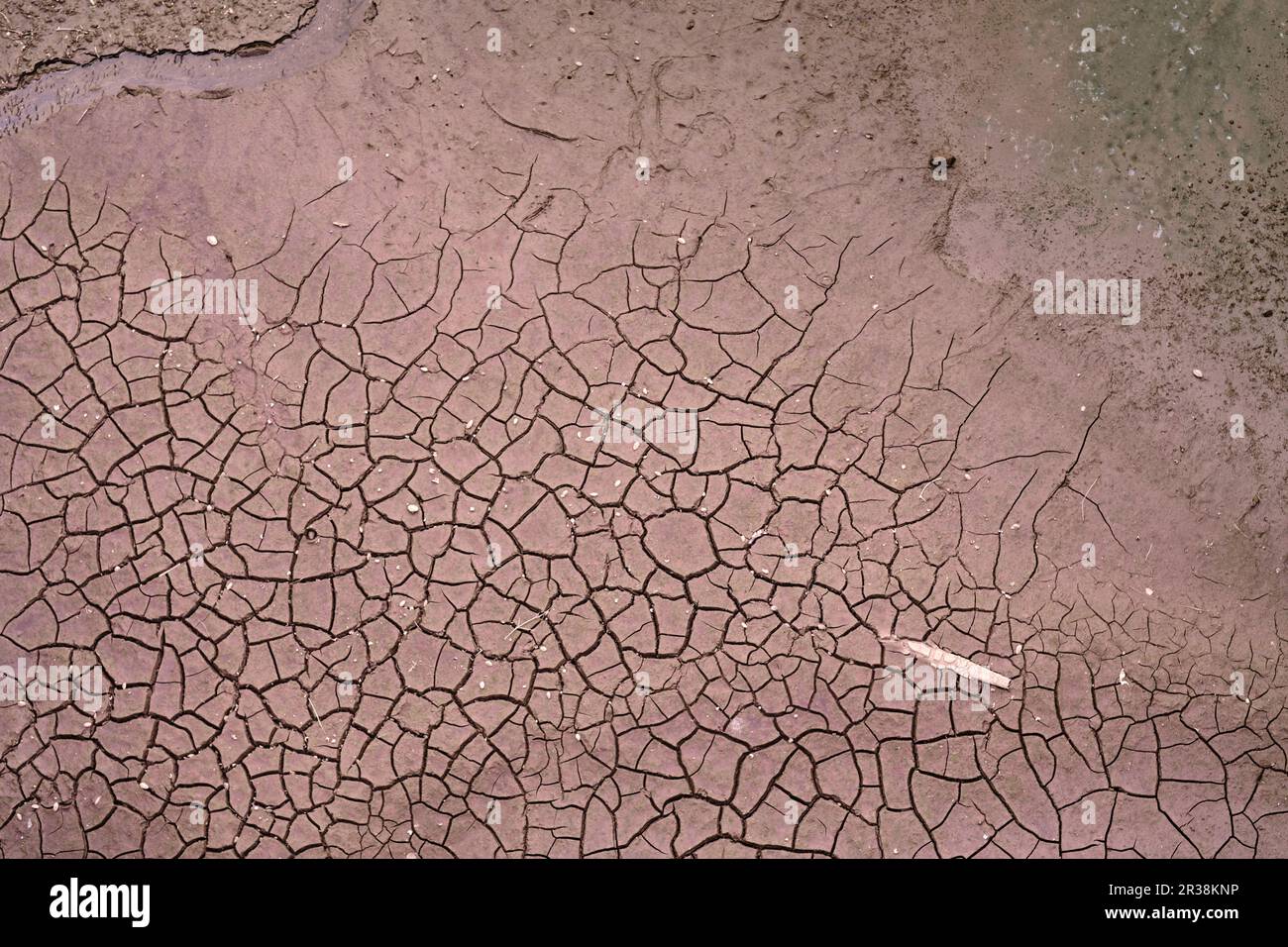 Top drone view on cracked dry soil on the river or sea bottom with a ...