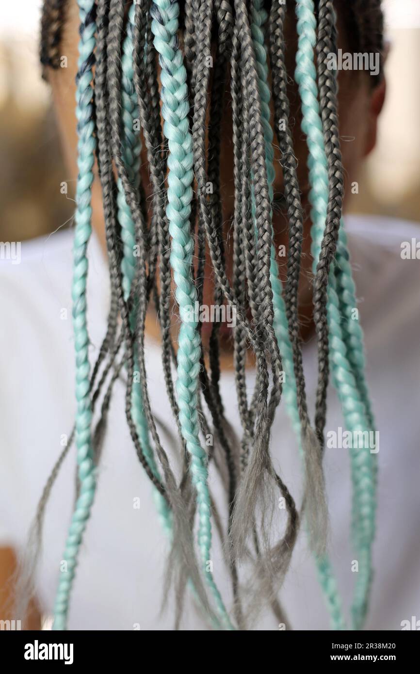 Thin braids in African style, French braids on the head of a man Stock Photo