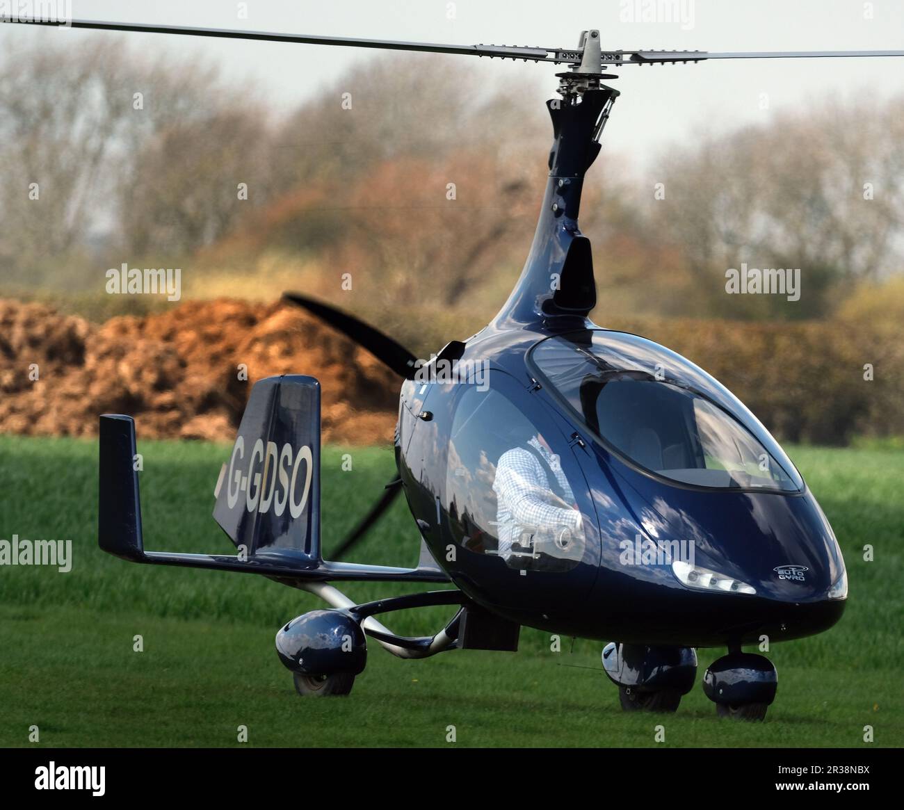 Modern autogyro aircraft visiting flying club in the UK. Stock Photo