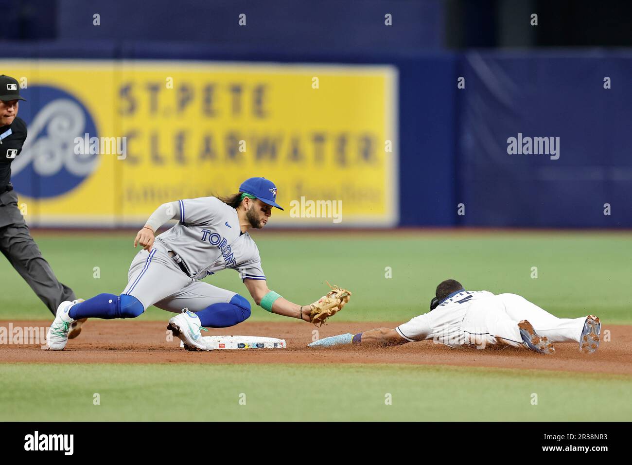 St. Petersburg, FL. USA; Tampa Bay Rays shortstop Wander Franco (5) slides  awkwardly into home plate and injures his forehead during a major league b  Stock Photo - Alamy