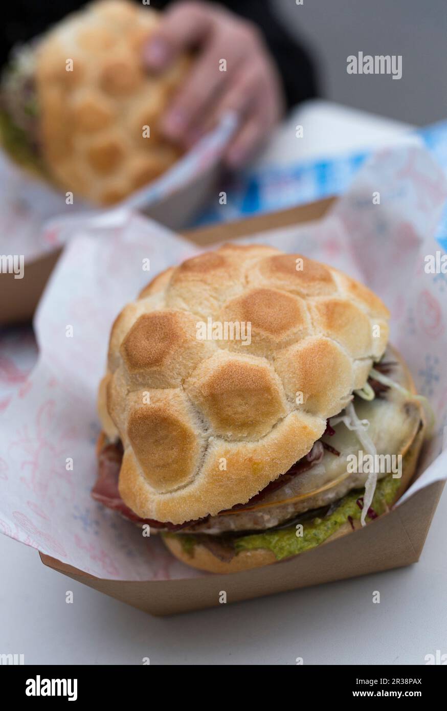 Fish burgers in cardboard takeaway trays Stock Photo Alamy