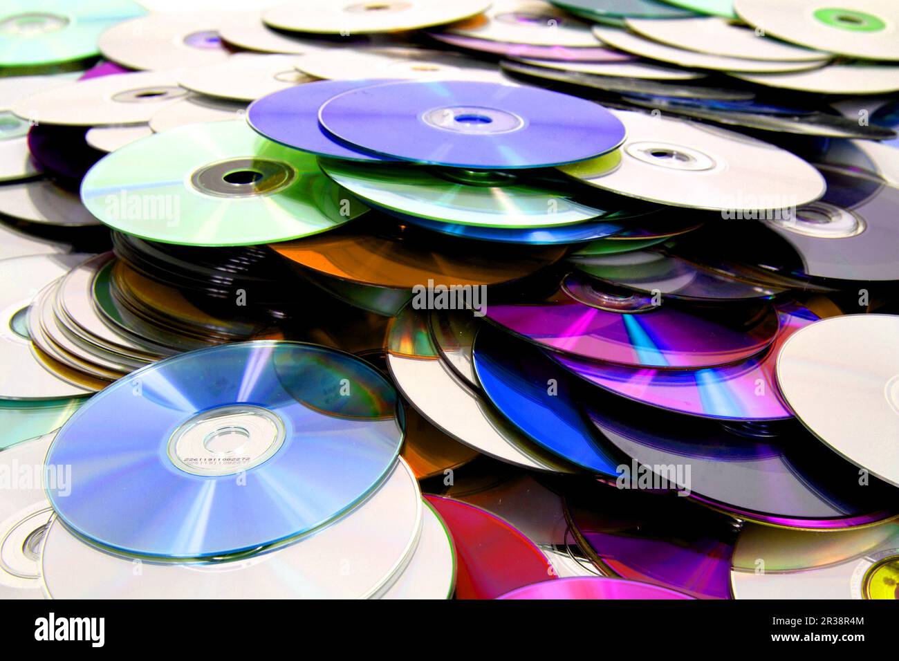 cd and dvd as nice technology background Stock Photo - Alamy
