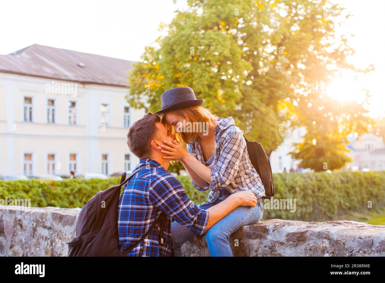 Portrait of romantic couple sitting face-to-face, love Stock Photo