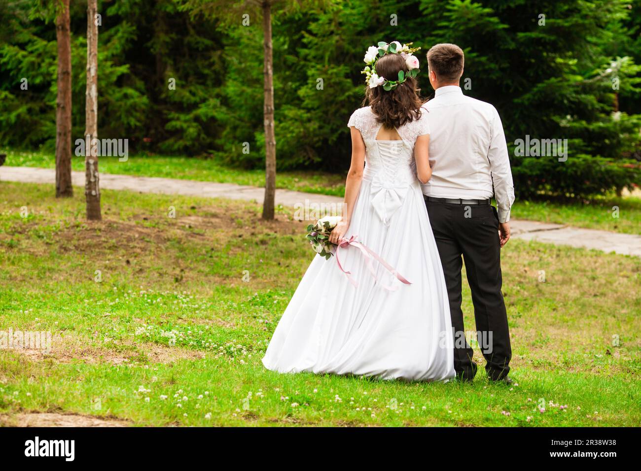 The bride gets married outdoors in the park Stock Photo