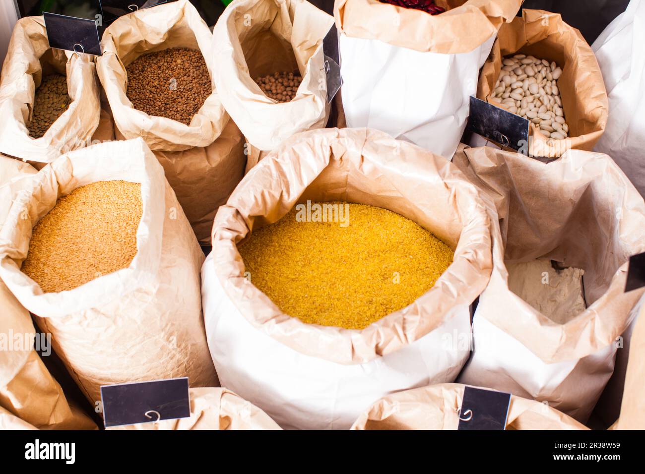 Full bags of cereals at vegan shop Stock Photo