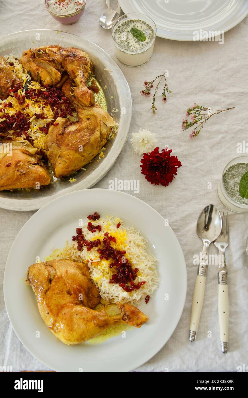 Zereshk Polo ba (saffronbraised chicken legs on barberry rice