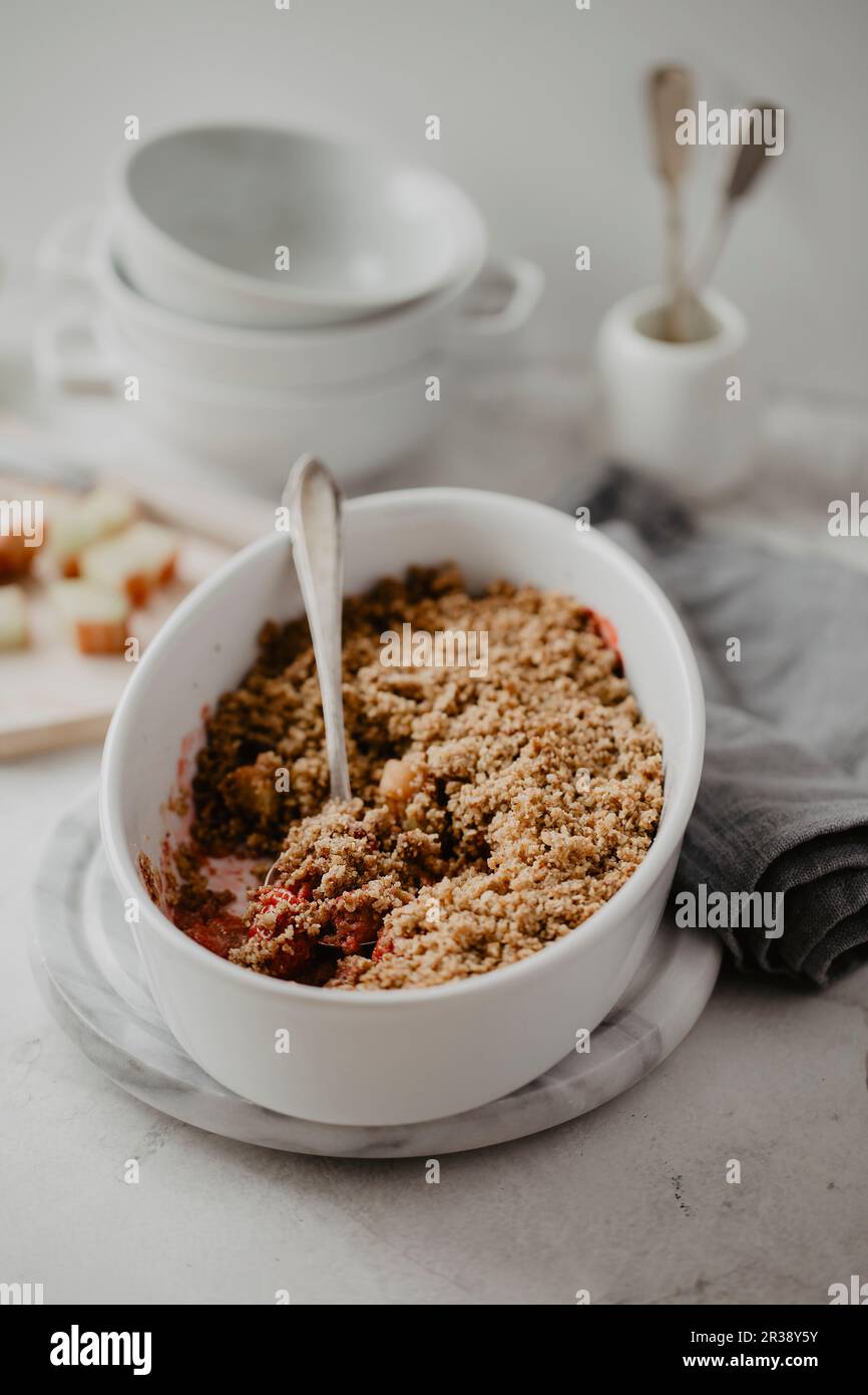 Glutenfree crumble with strawberries, rhubarb, oats, walnuts, cinnamon