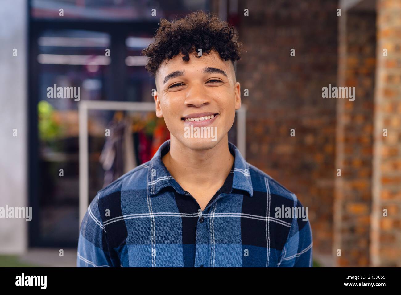 Portrait happy biracial creative businesswoman hi res stock photography