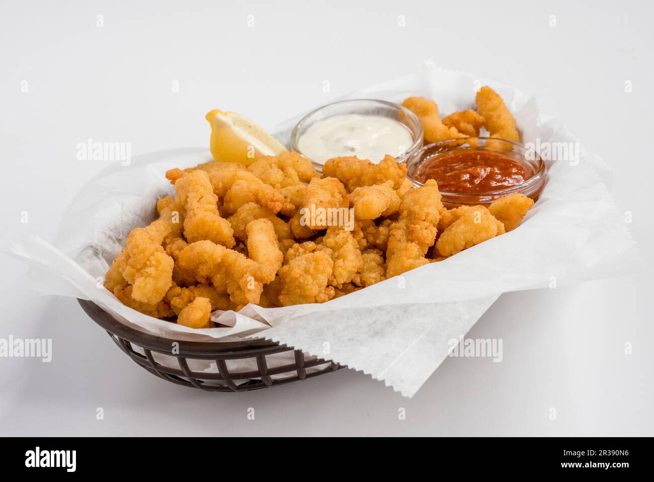 Fish in batter with two dips Stock Photo Alamy