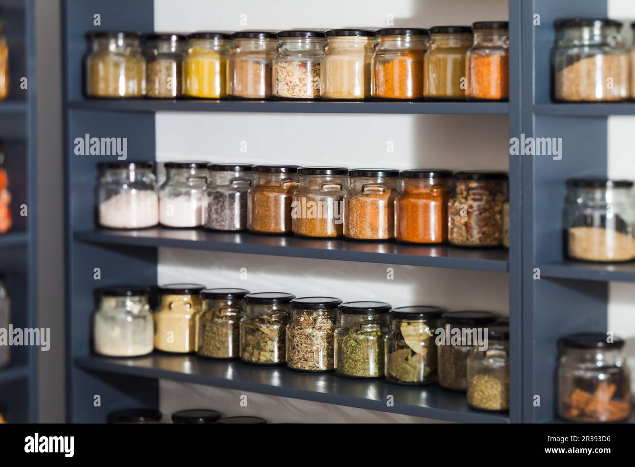 Shelf in a shop with colorful natural herbs and spices Stock Photo Alamy