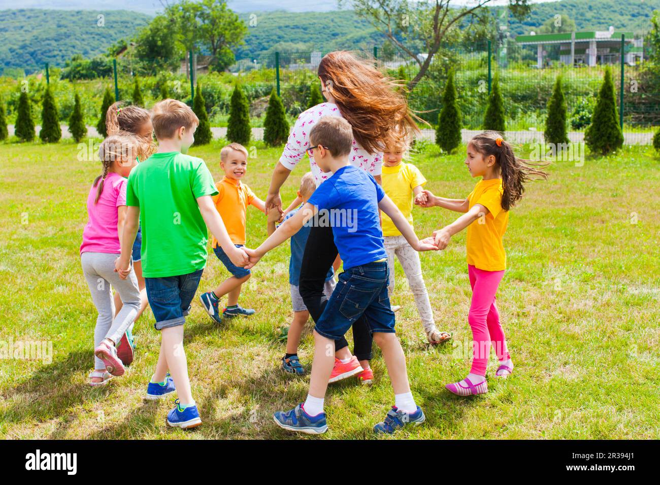 Outdoors games and funny time, singing and dancing Stock Photo