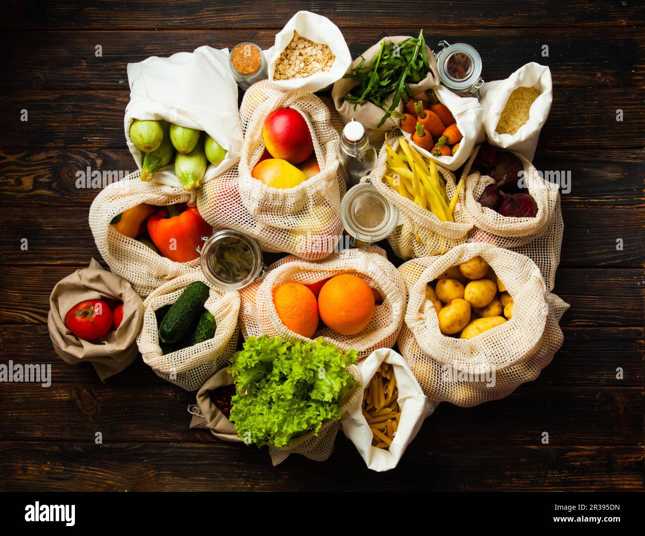 Vegetables in eco cotton bags. Zero waste food shopping. Stock Photo