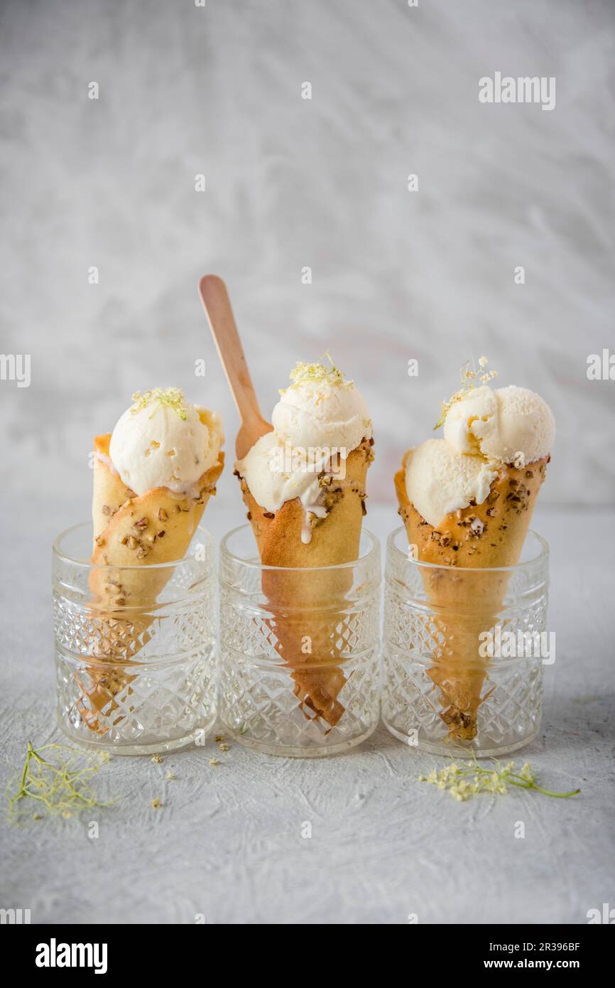 Lemon and elderflower ice cream in homemade waffle cones Stock Photo