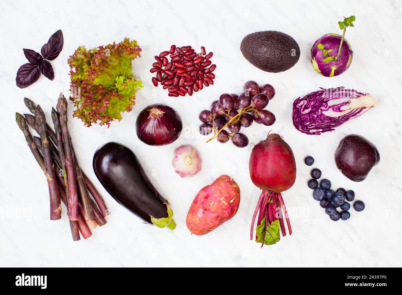 Mix of fresh organic vegetables with berries Stock Photo