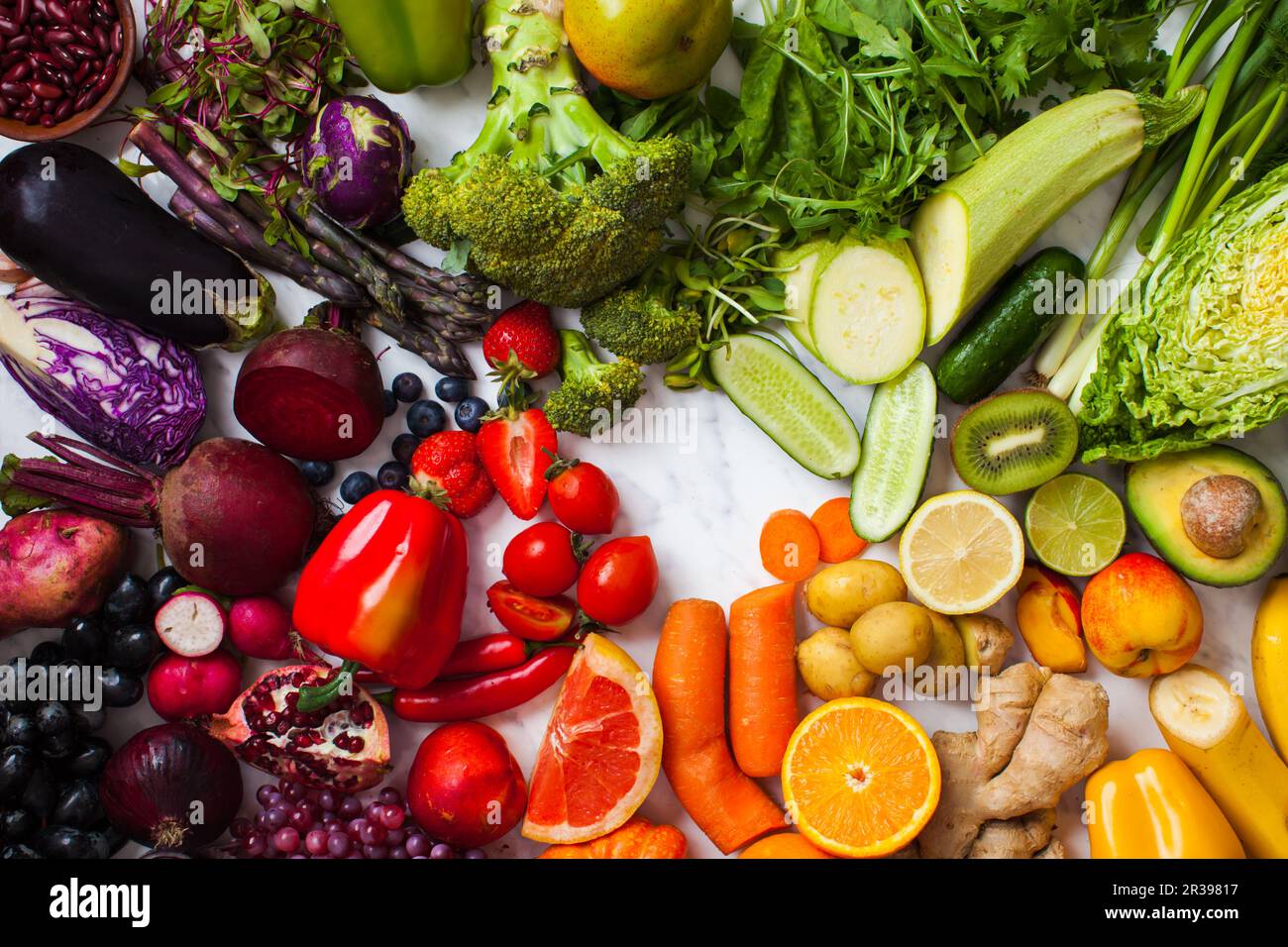 Fruits and berries rainbow top view. Natural vitamins Stock Photo