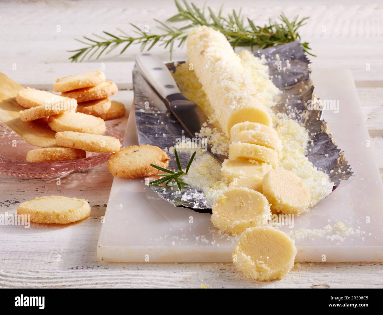 Raw and baked rosemary shortbread biscuits Stock Photo Alamy