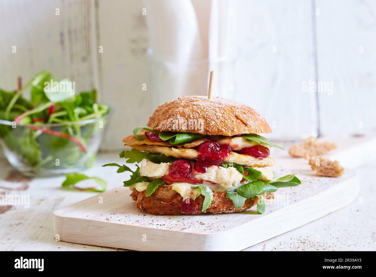 A chicken burger with camembert and cranberry sauce Stock Photo - Alamy