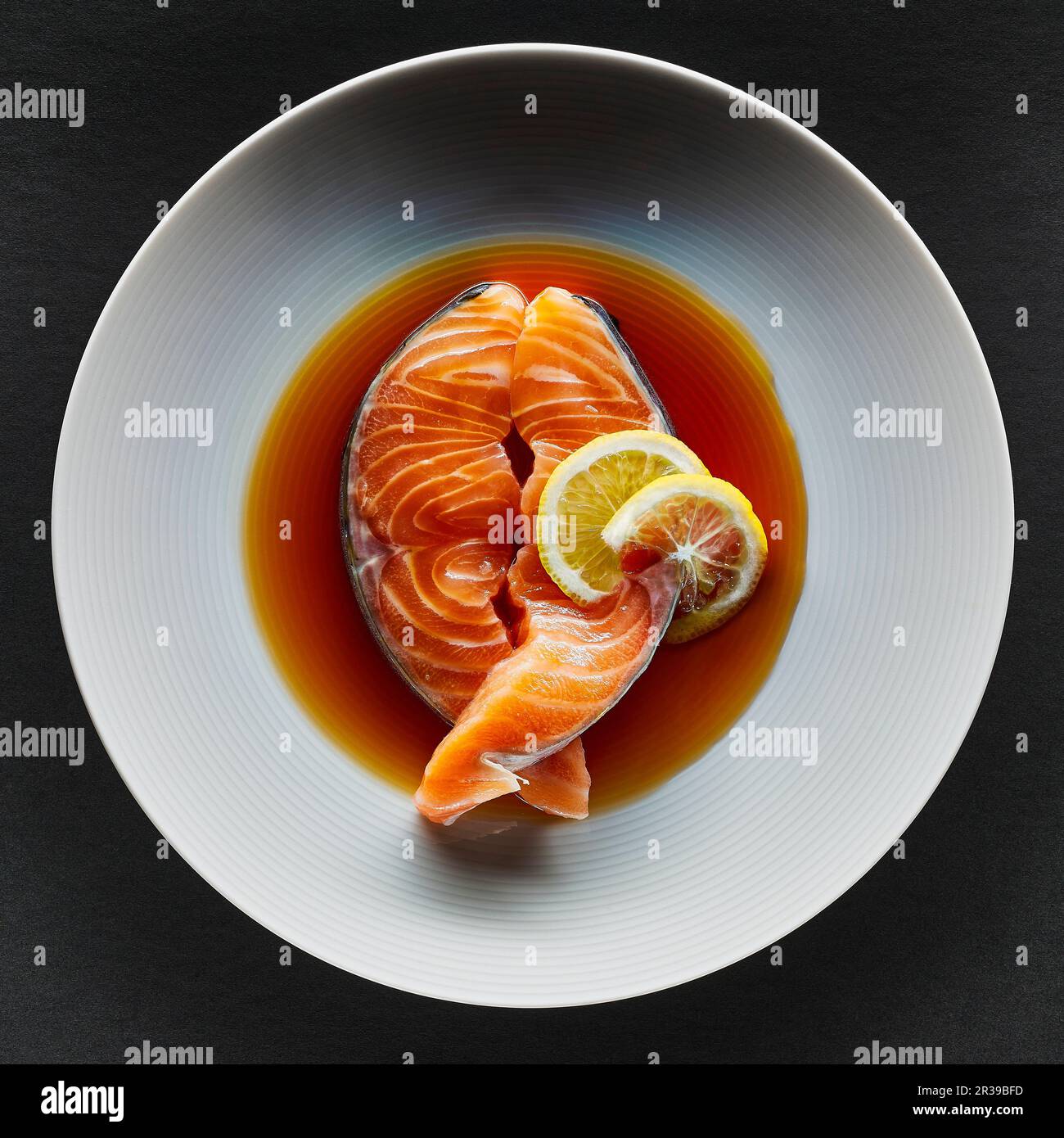 Slab of salmon with lemon Stock Photo Alamy
