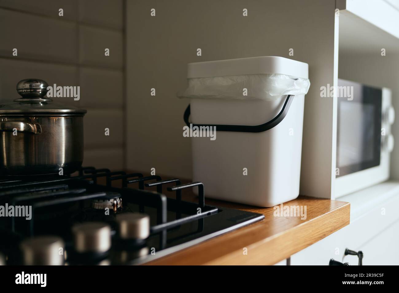 Compact compost bin on a kitchen counter. Domestic bokashi container