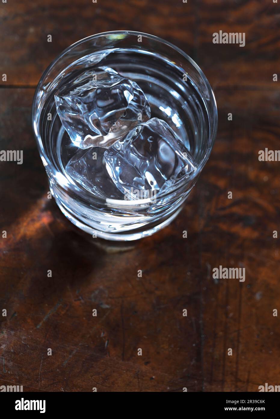 Glass of water with ice cubes Stock Photo - Alamy