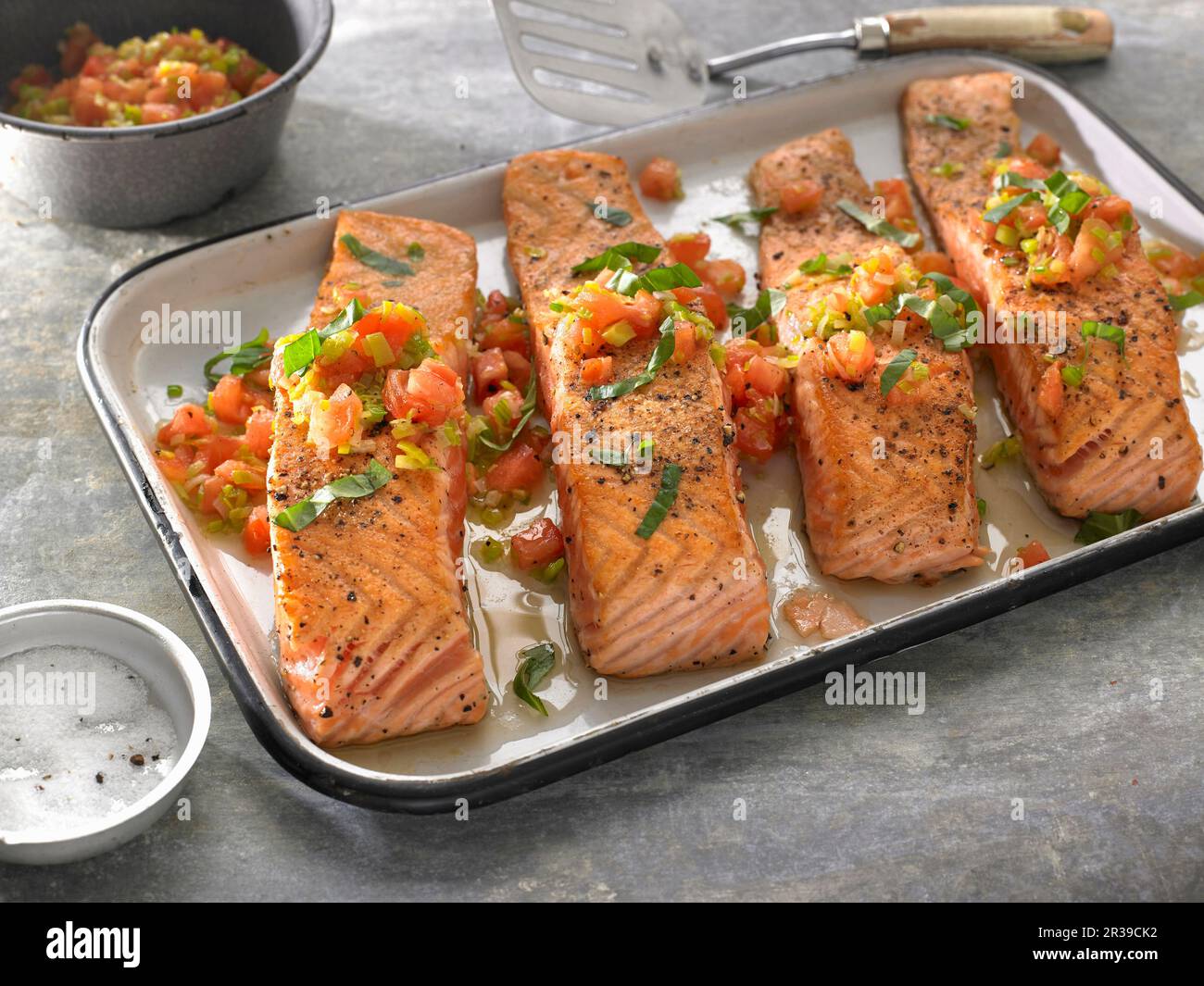 Sauteed Boneless Salmon Fillets with Leeks Stock Photo - Alamy