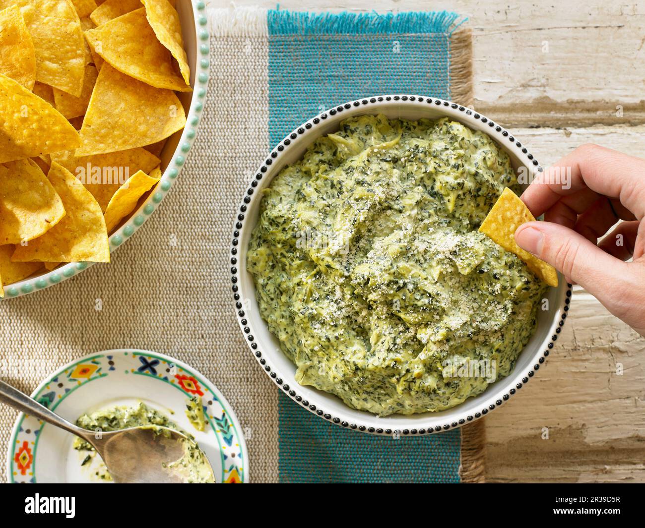 Spinach Artichoke Dip with Tortilla Chips Stock Photo Alamy