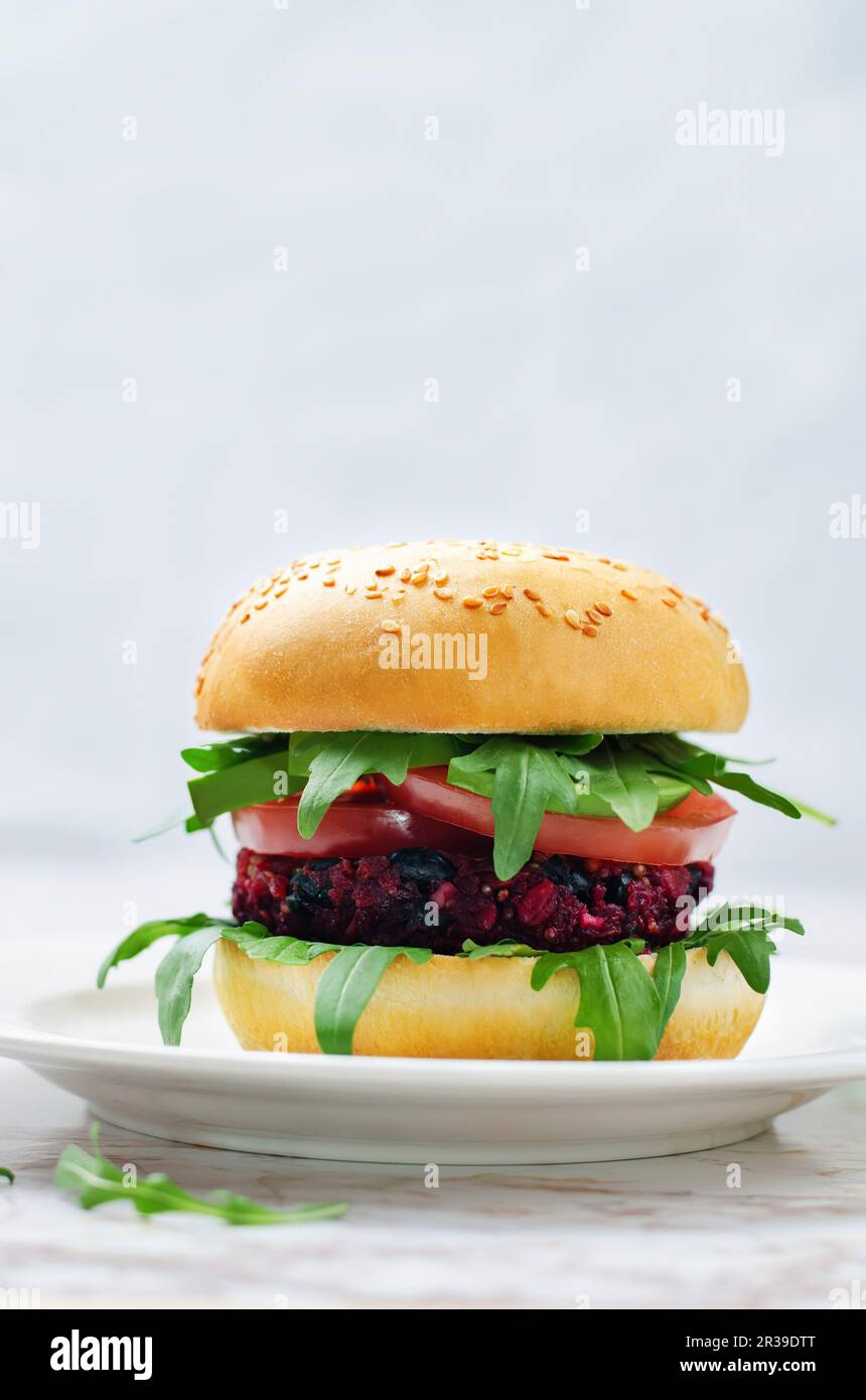 Black beans quinoa beet walnuts burger Stock Photo Alamy
