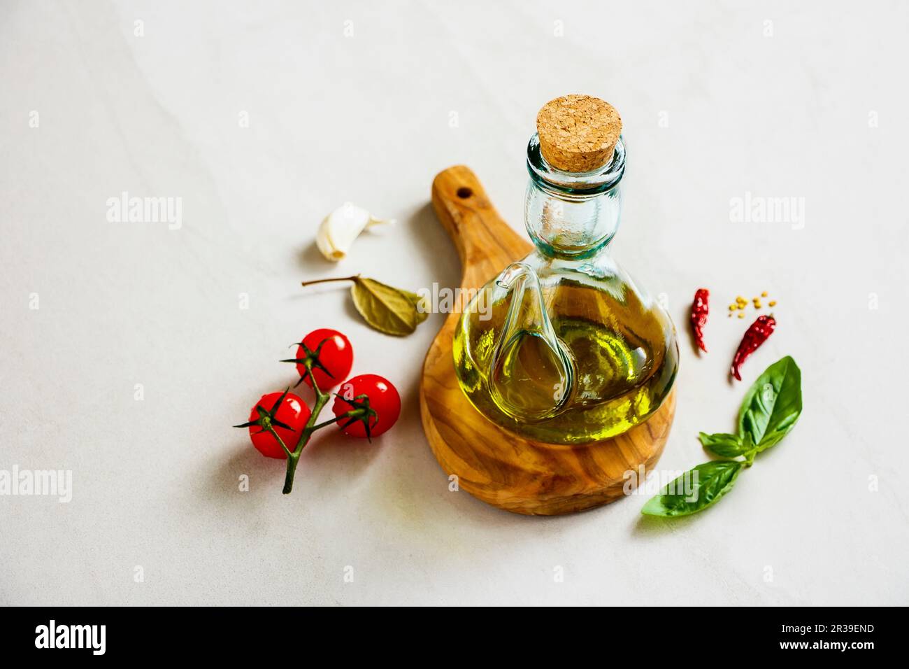 Olive oil and healthy seasonal ingredients Stock Photo