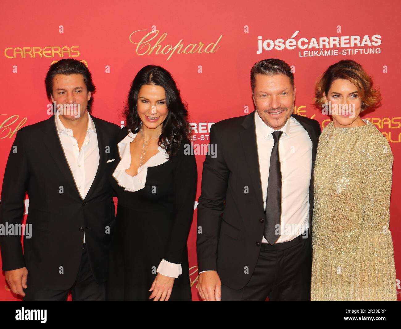 Michael Raumann with girlfriend Mariella Ahrens and actor Hardy KrÃ¼ger