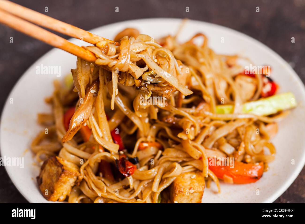 Asian vegan udon noodles with tofu and vegetables Stock Photo Alamy