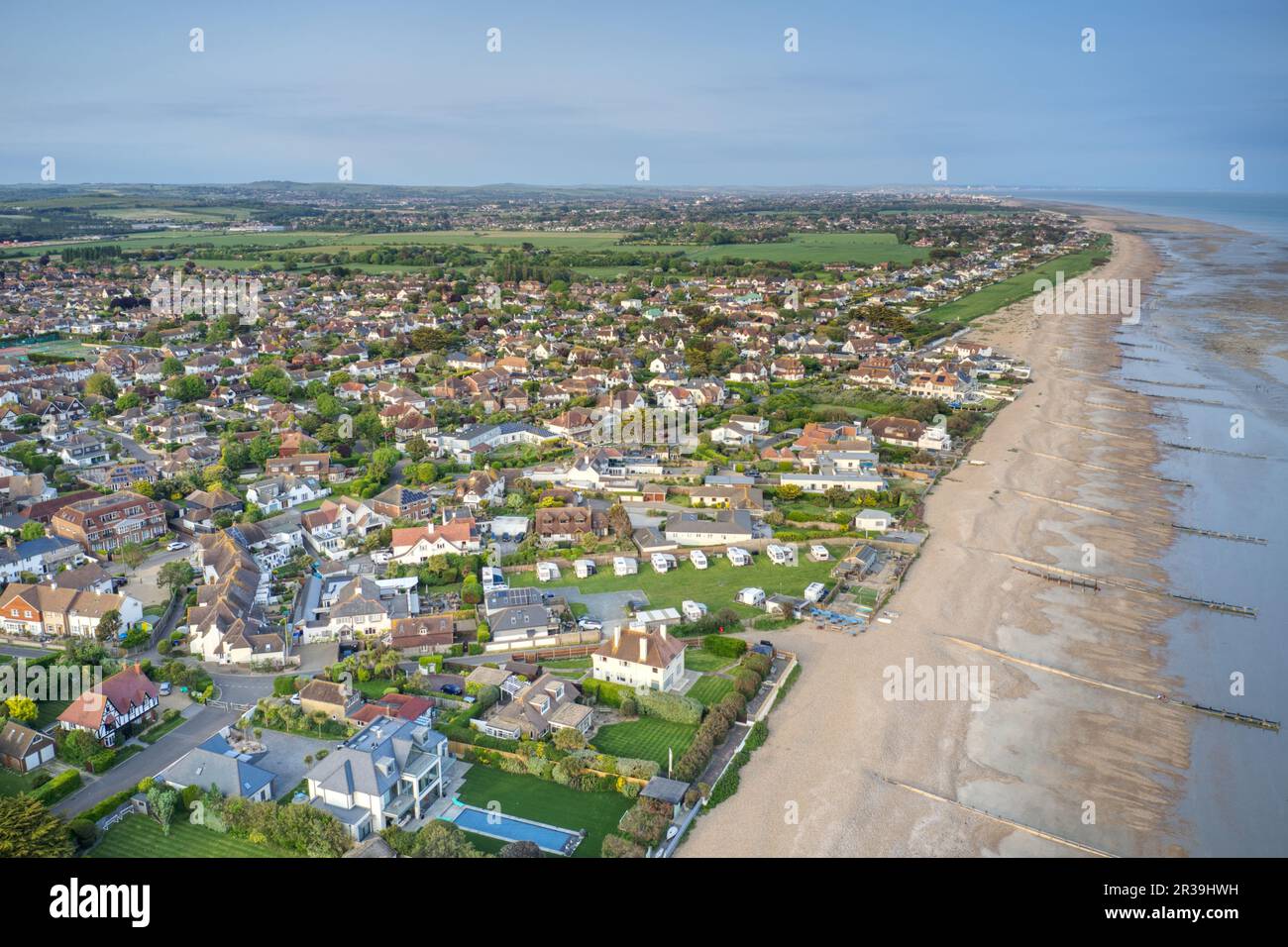Aerial view along the beach and Sea Road in East Preston on the Southern coast of England in West Sussex. Stock Photo